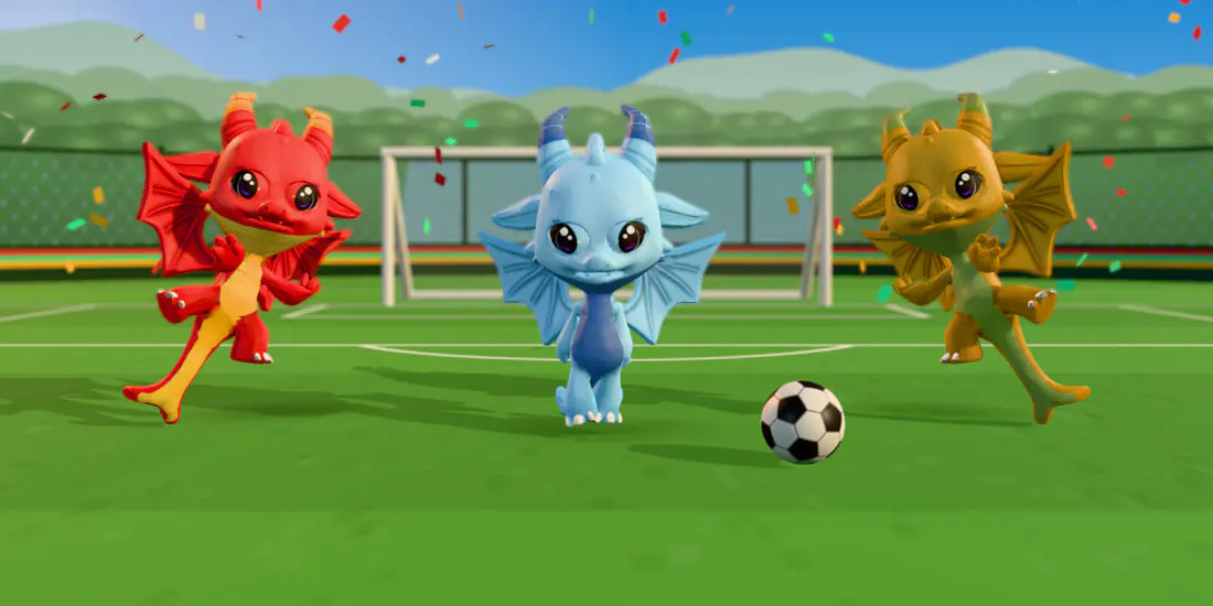 Three 3D dragons, red, blue and gold, on a sunny football pitch in front of a goal.